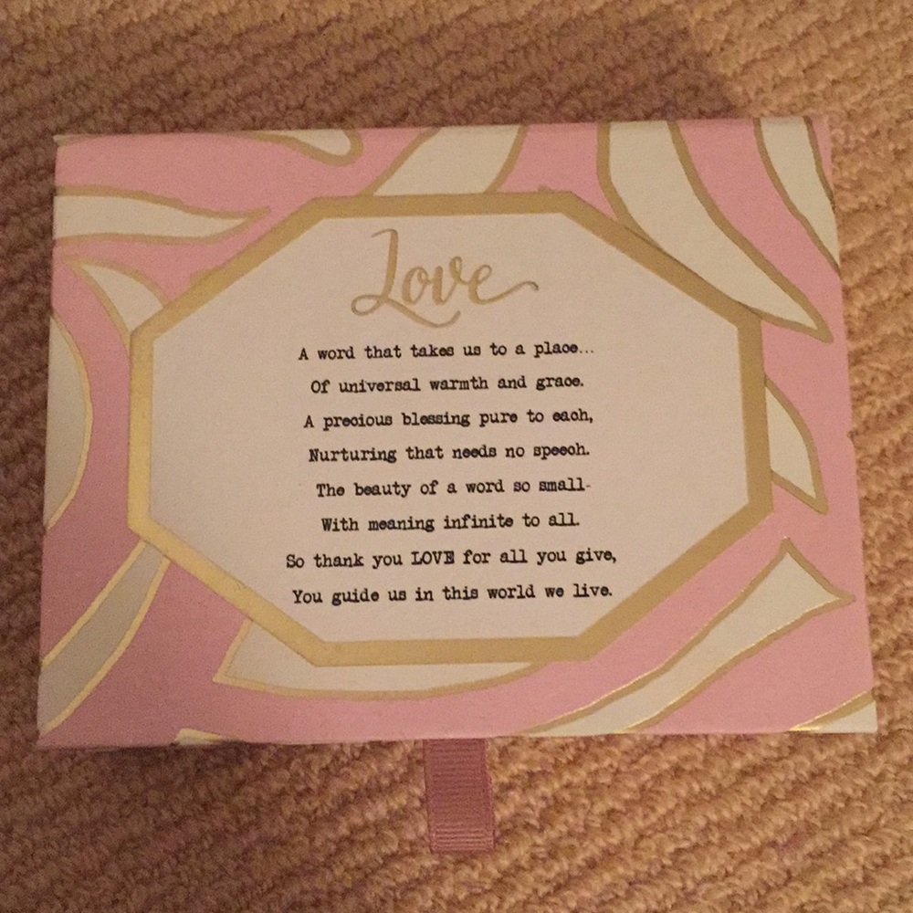Lulu DK “love” gold spin necklace
